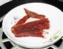 腊肉条炒蒜薹的做法图解2